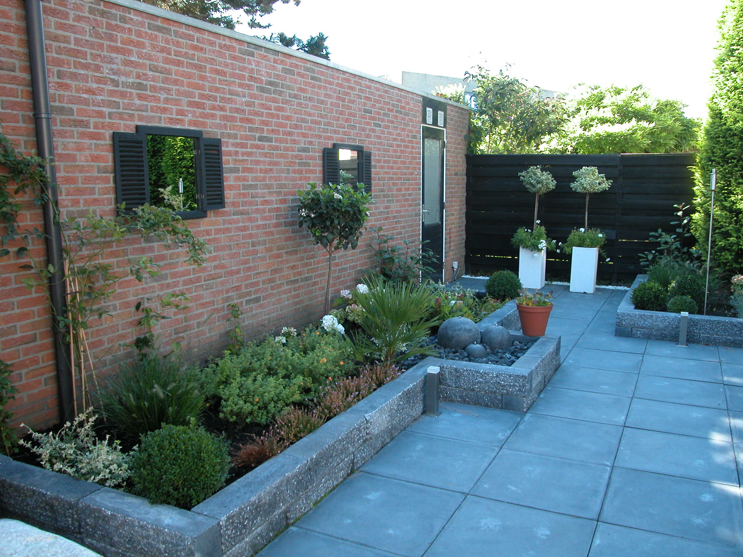 Tuinproject van Quercus Garden – schutting en terras